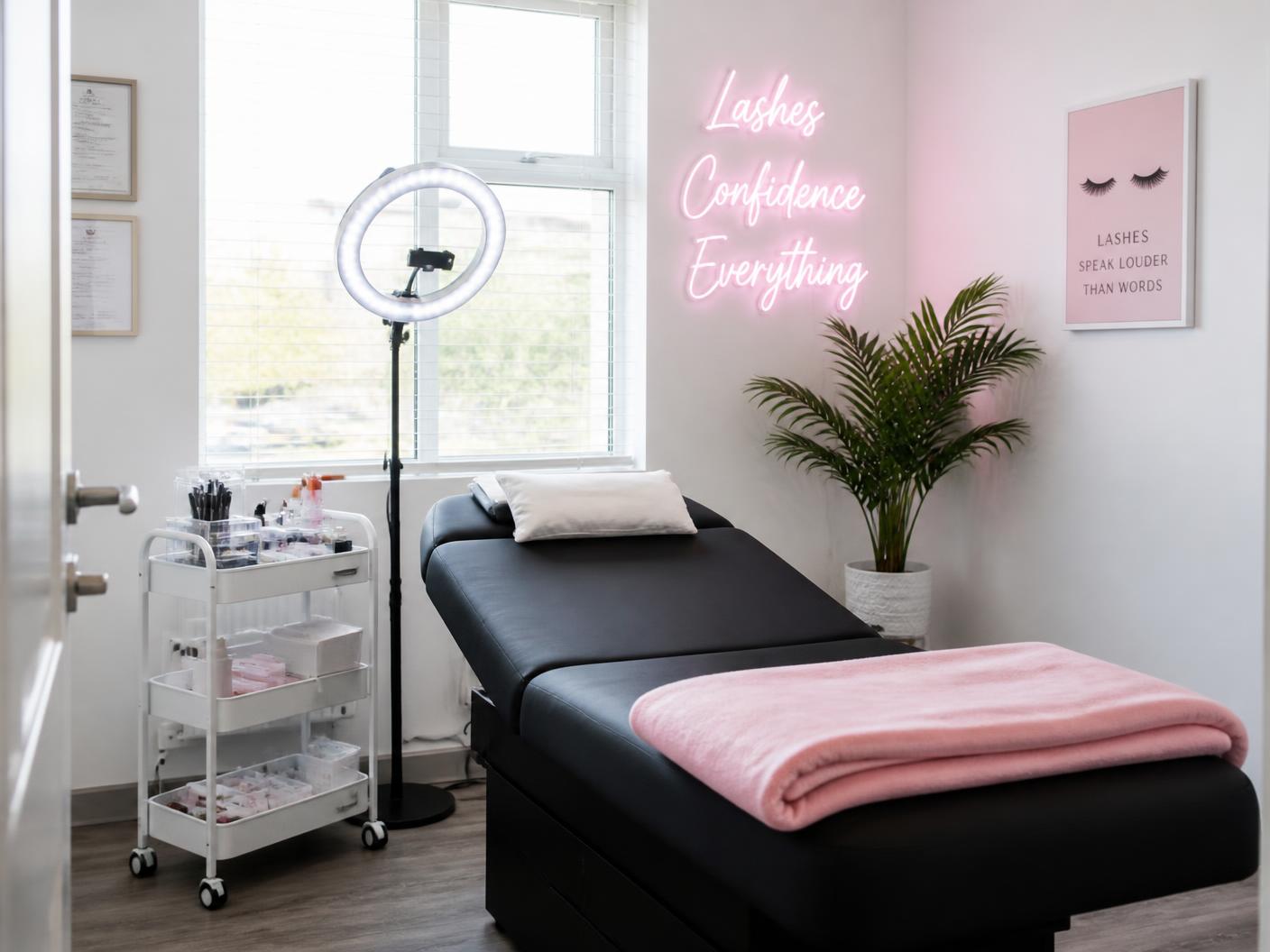Soft pink interior of the Wink Lash Studio treatment room